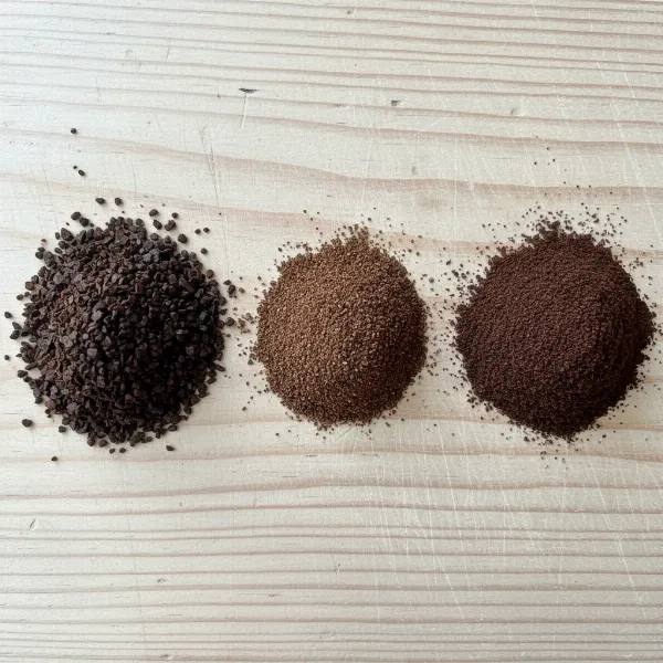 Various coffee grind sizes, from coarse for French press to very fine for espresso, illustrating consistency.